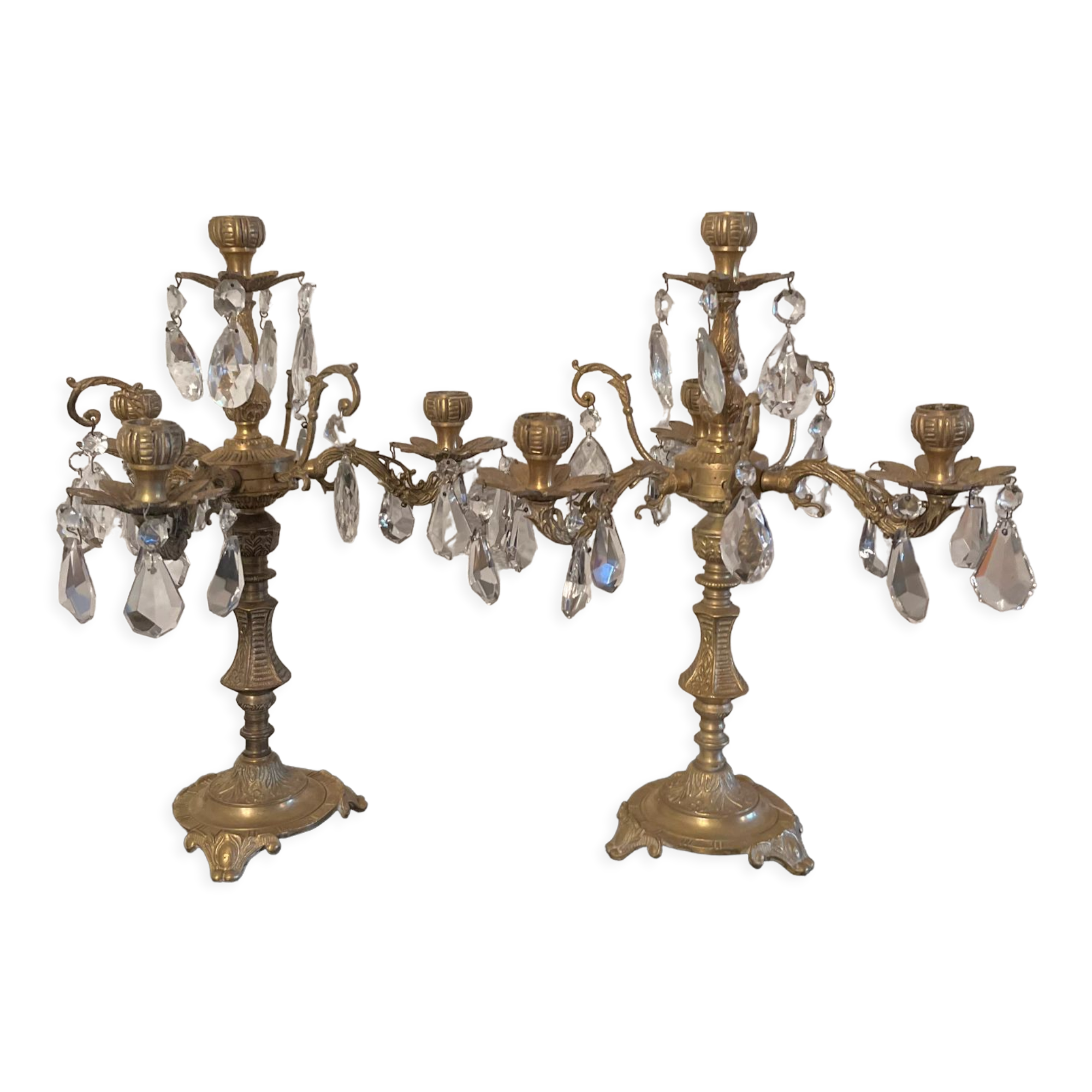Duo of bronze chandeliers with tassels