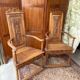 Pair of carved walnut armchairs in Renaissance style