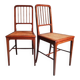 Pair of caned mahogany chairs, circa 1930.