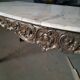 Pedestrian coffee table above marble