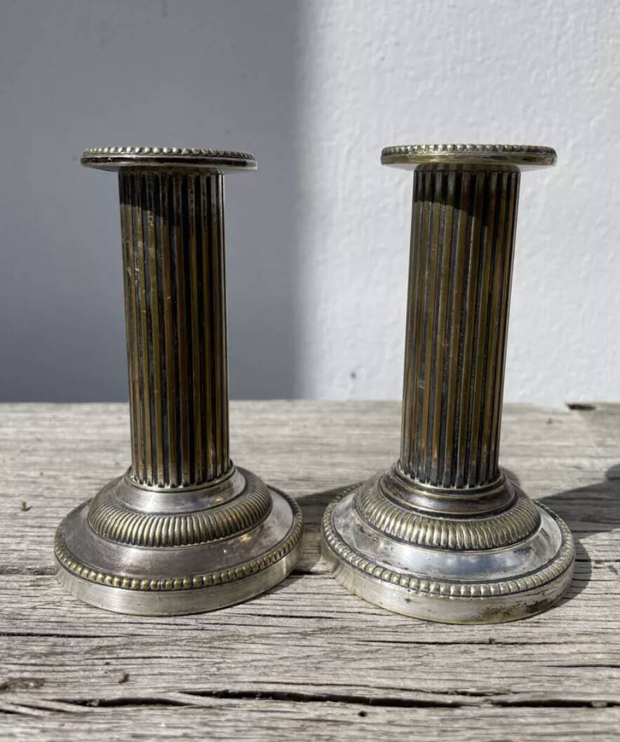 Pair of 19th-century fluted silver-plated metal candlesticks