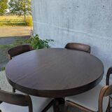 Round table with butterfly extensions