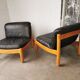 Pair of designer leather armchairs 80s