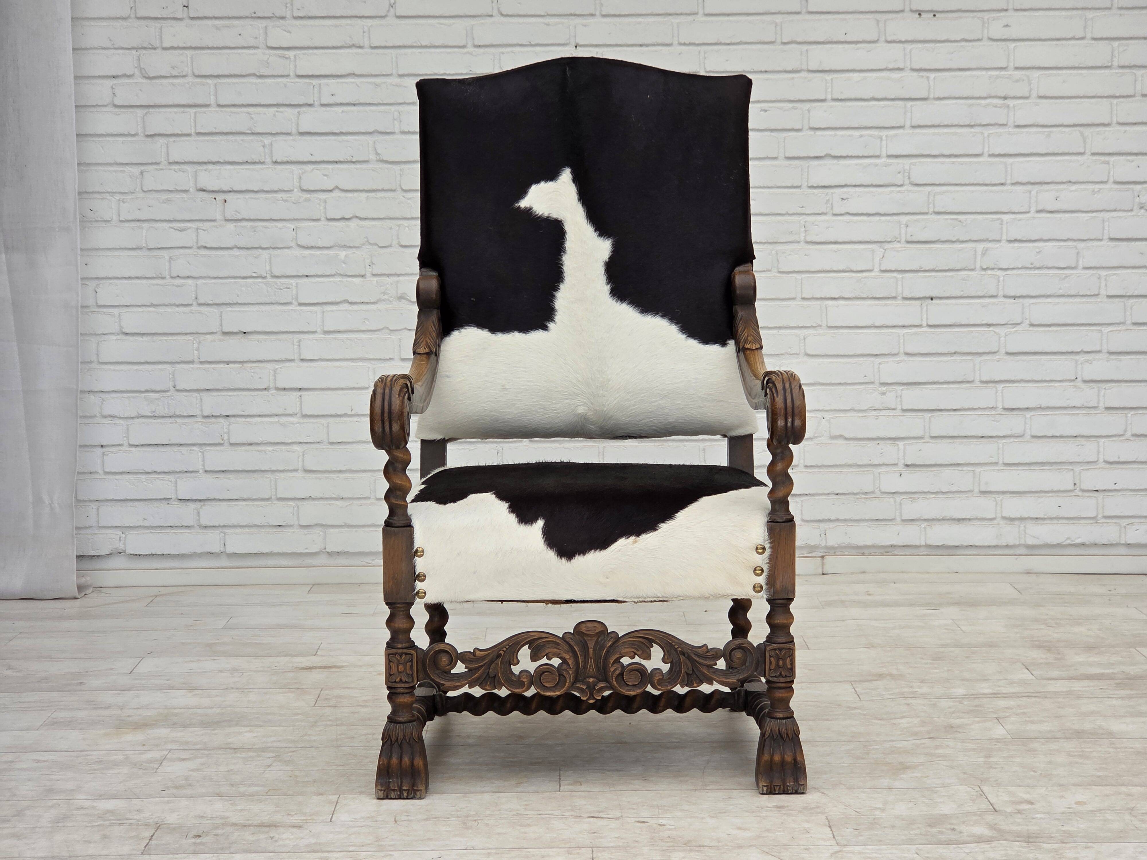 1950s, Danish highback armchair, genuine cowhide, oak wood.