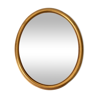 Curved mirror witch's eye in gilded wood