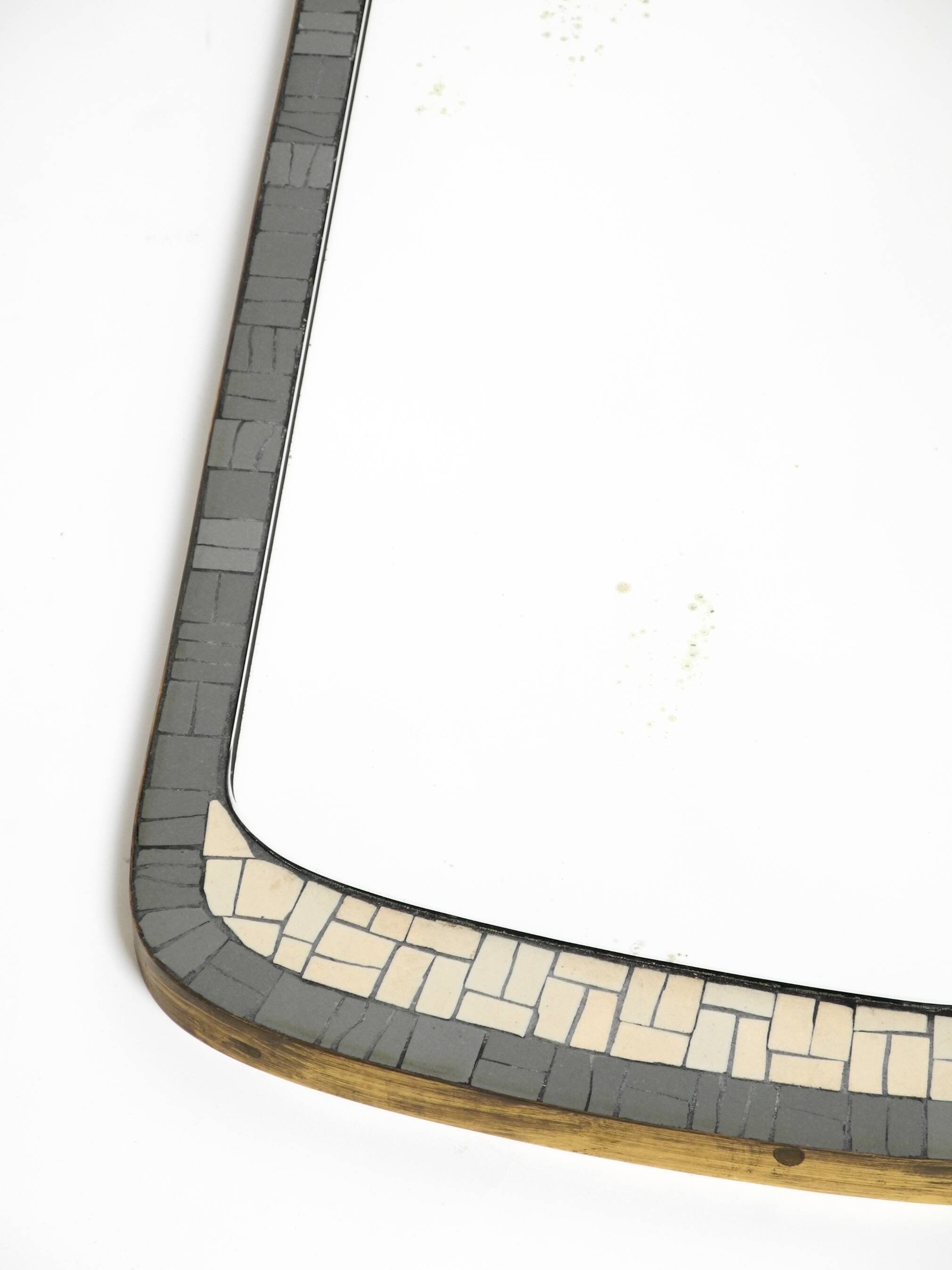 Mid Century mosaic wall mirror with brass frame by Münchner Zierspiegel