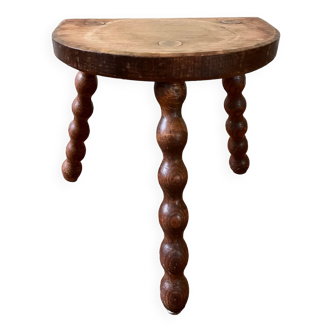 Low vintage wooden tripod stool