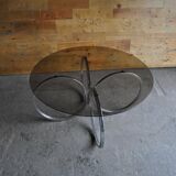 Vintage tubular coffee table in chrome with a transparent glass top, Mid-Century style 1960s.