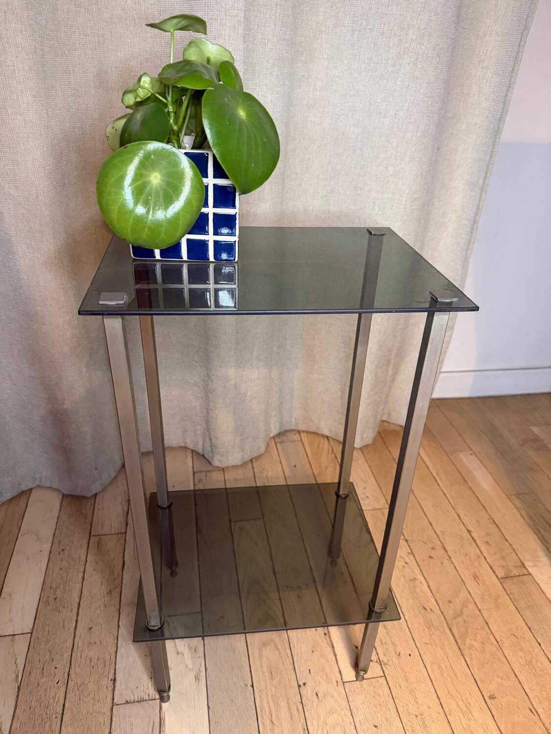 Smoked glass side table from the 1970s.