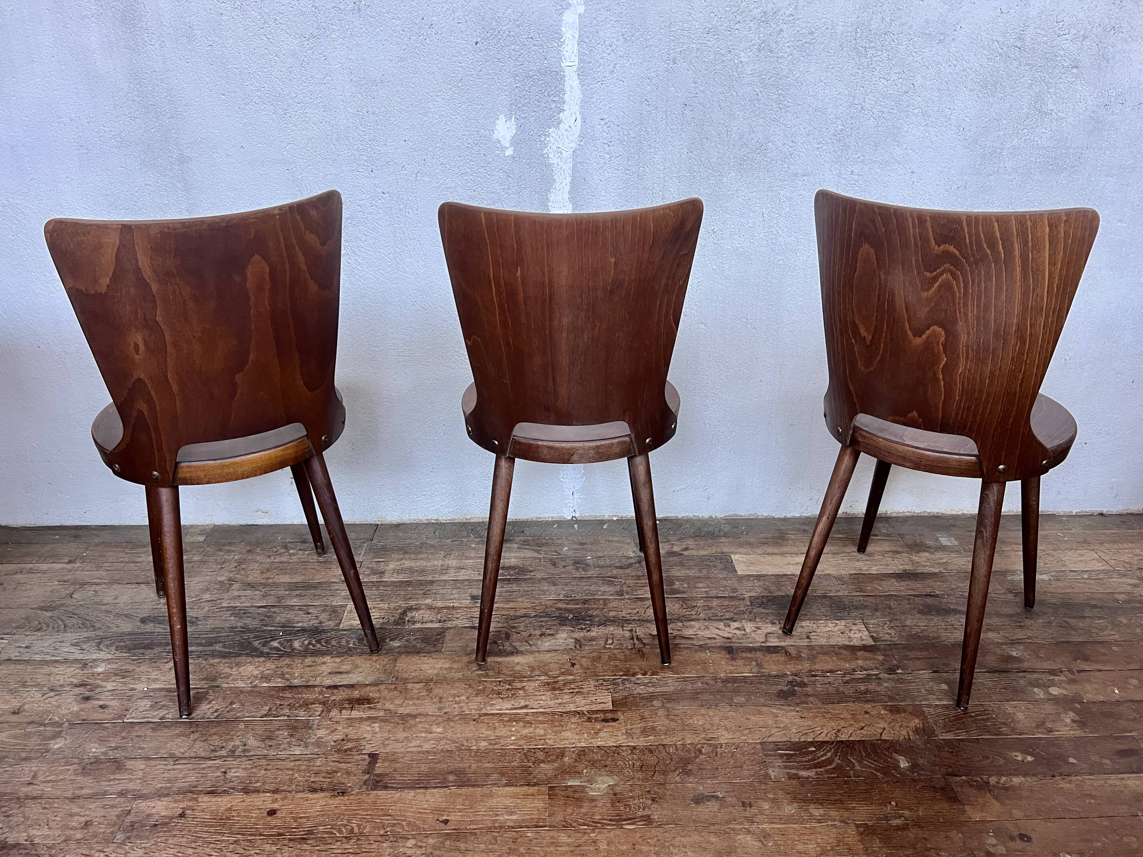 Trio of vintage retro Dove Baumann chairs 1960