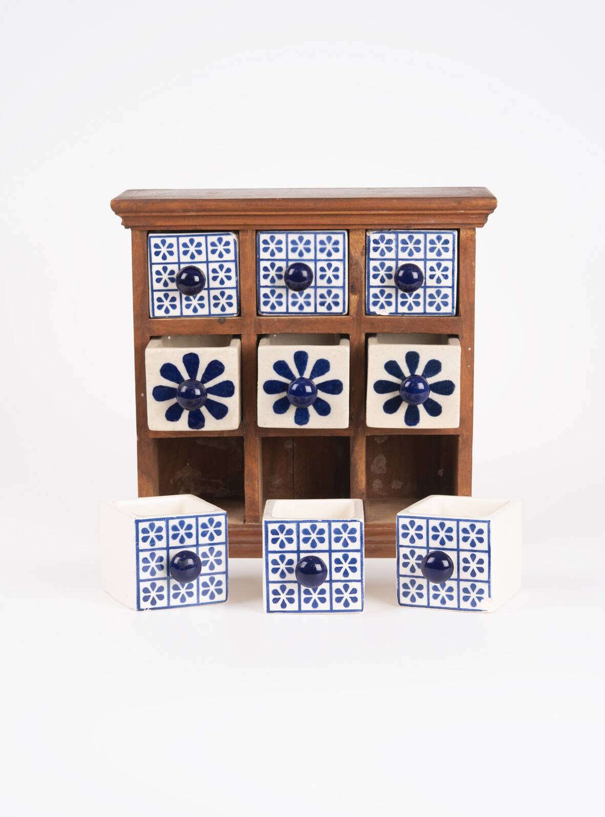 Earthenware spice rack with 9 drawers