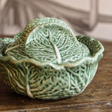 Covered pot in slip, collard greens