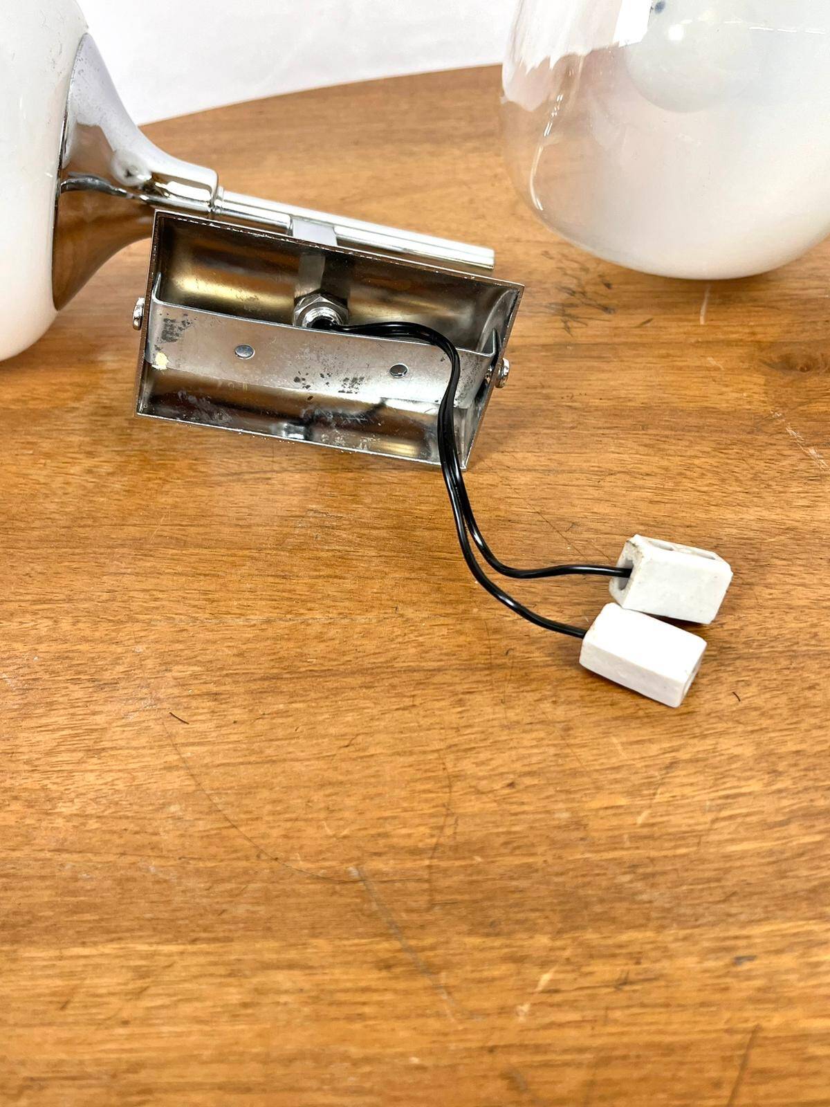 Pair of wall lights from Sciolari in pearly white glass