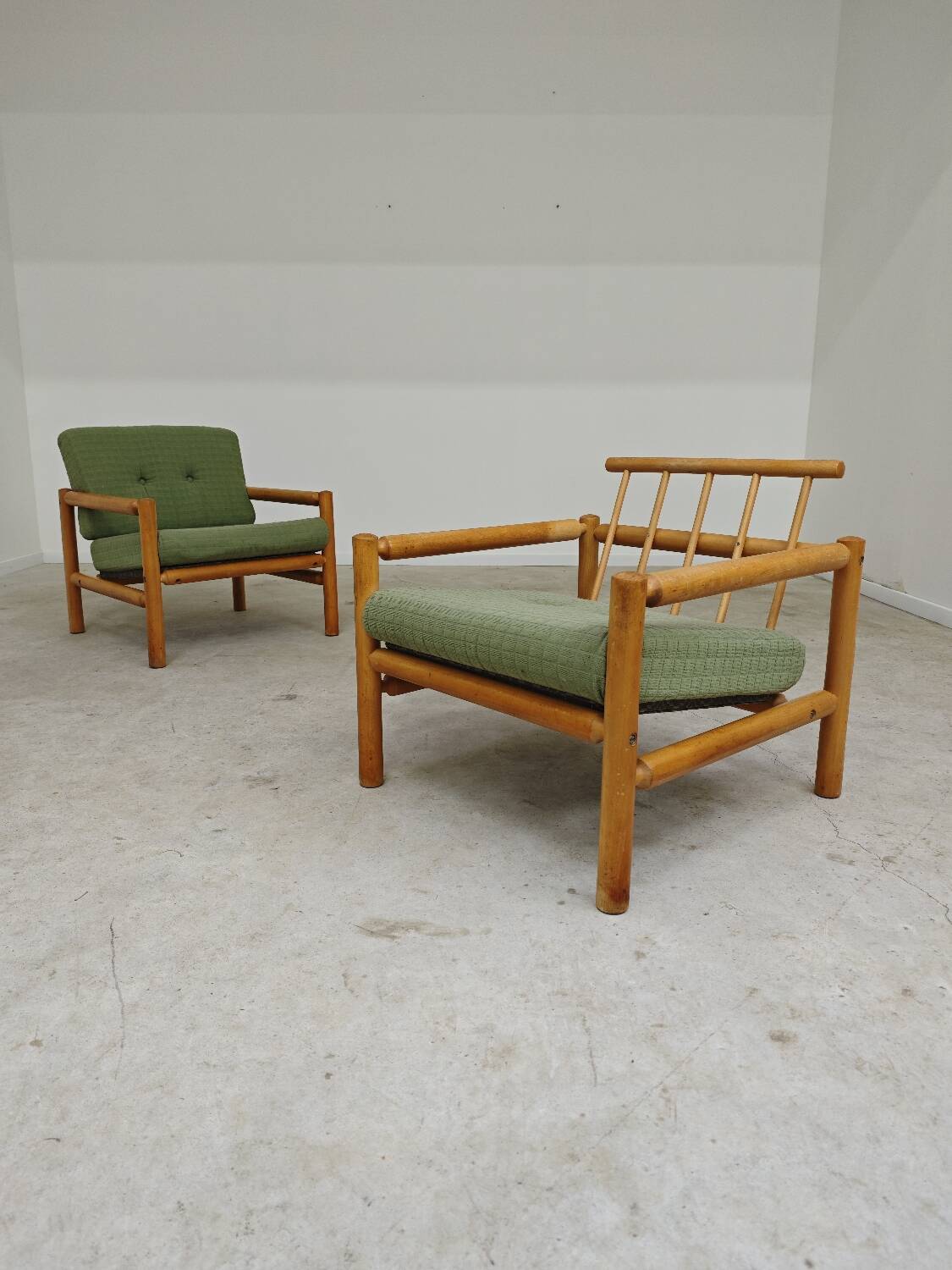 Pair of chalet style armchairs in green fabric