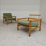Pair of chalet style armchairs in green fabric