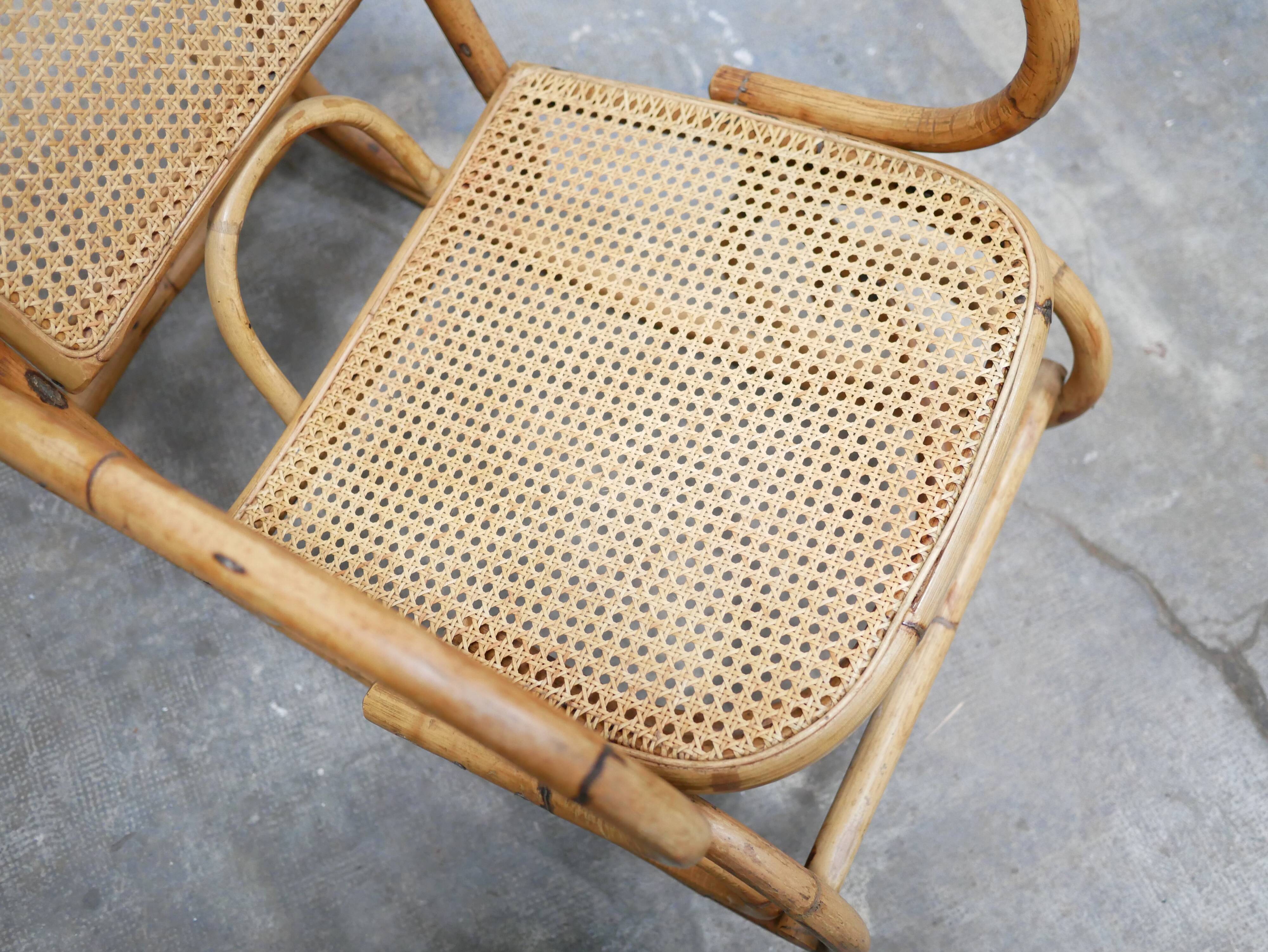 Fauteuil à bascule vintage en rotin et cannage