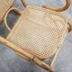 Fauteuil à bascule vintage en rotin et cannage