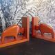 Pair of teak bookends in the shape of a bison