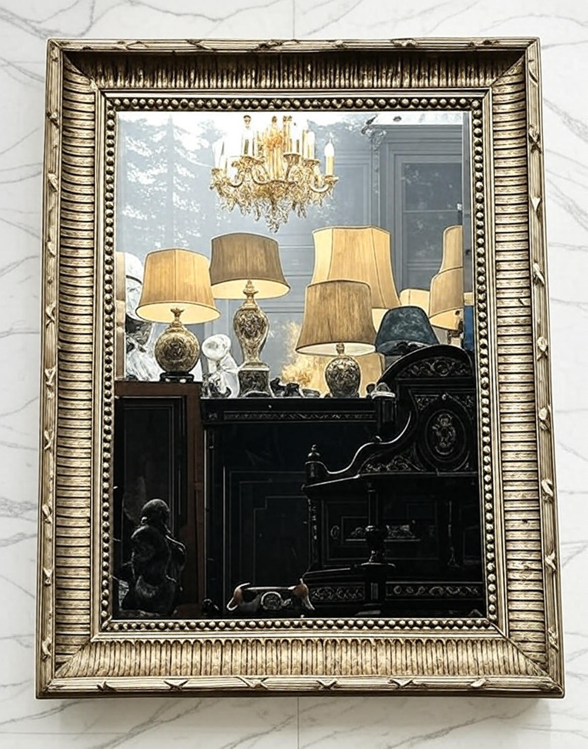 Mirror in a frame with a moulding.