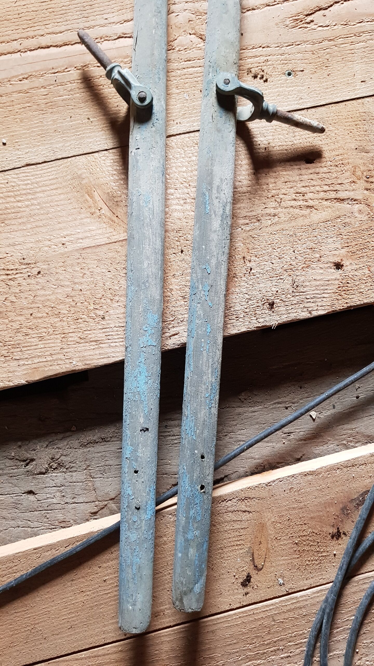 Pair of old wooden oars