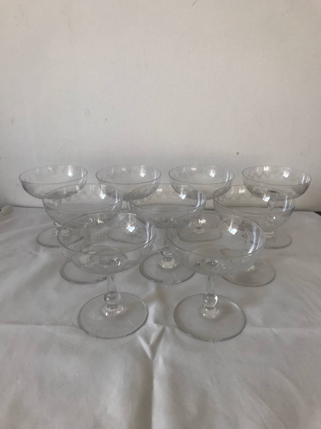 Set of 9 antique champagne glasses in engraved glass