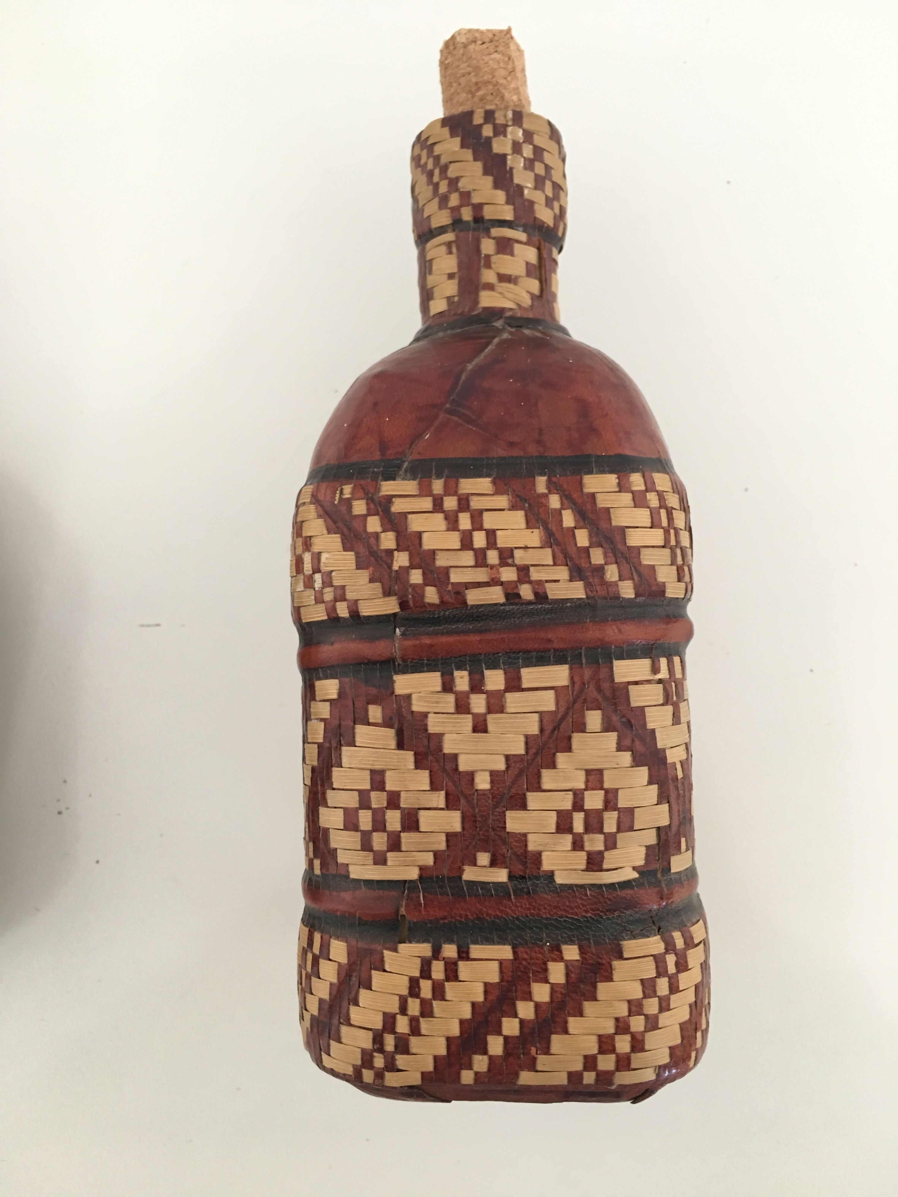 Lot of 2 ethnic leather-wrapped bottles and box