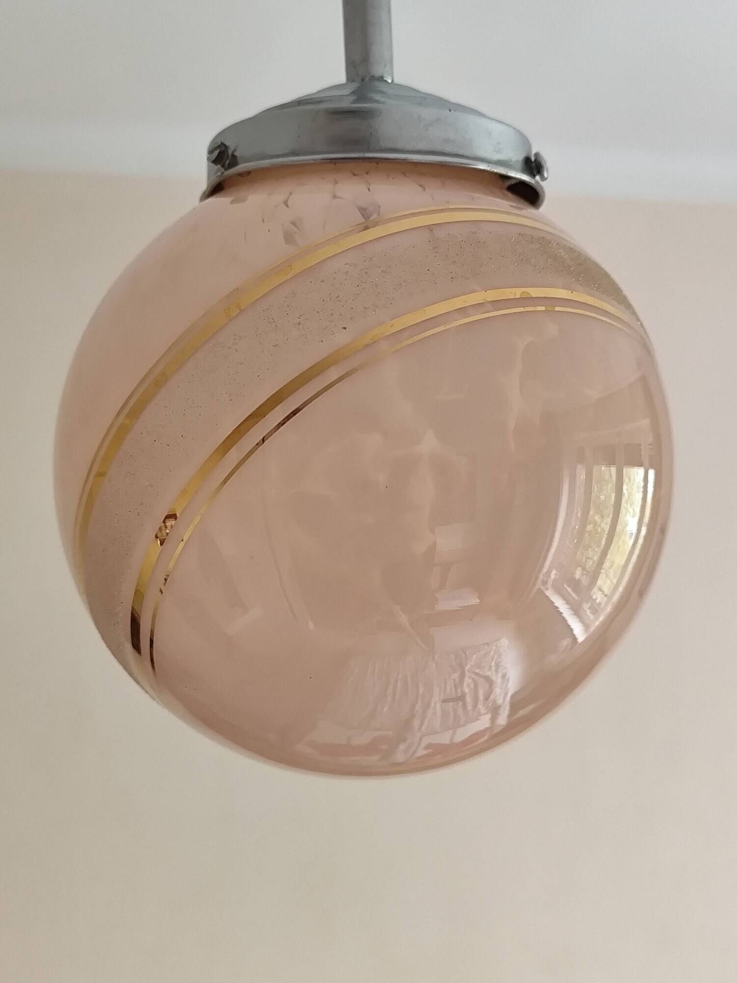 suspension glass globe pink and gold on a metal aluminium stem and structure