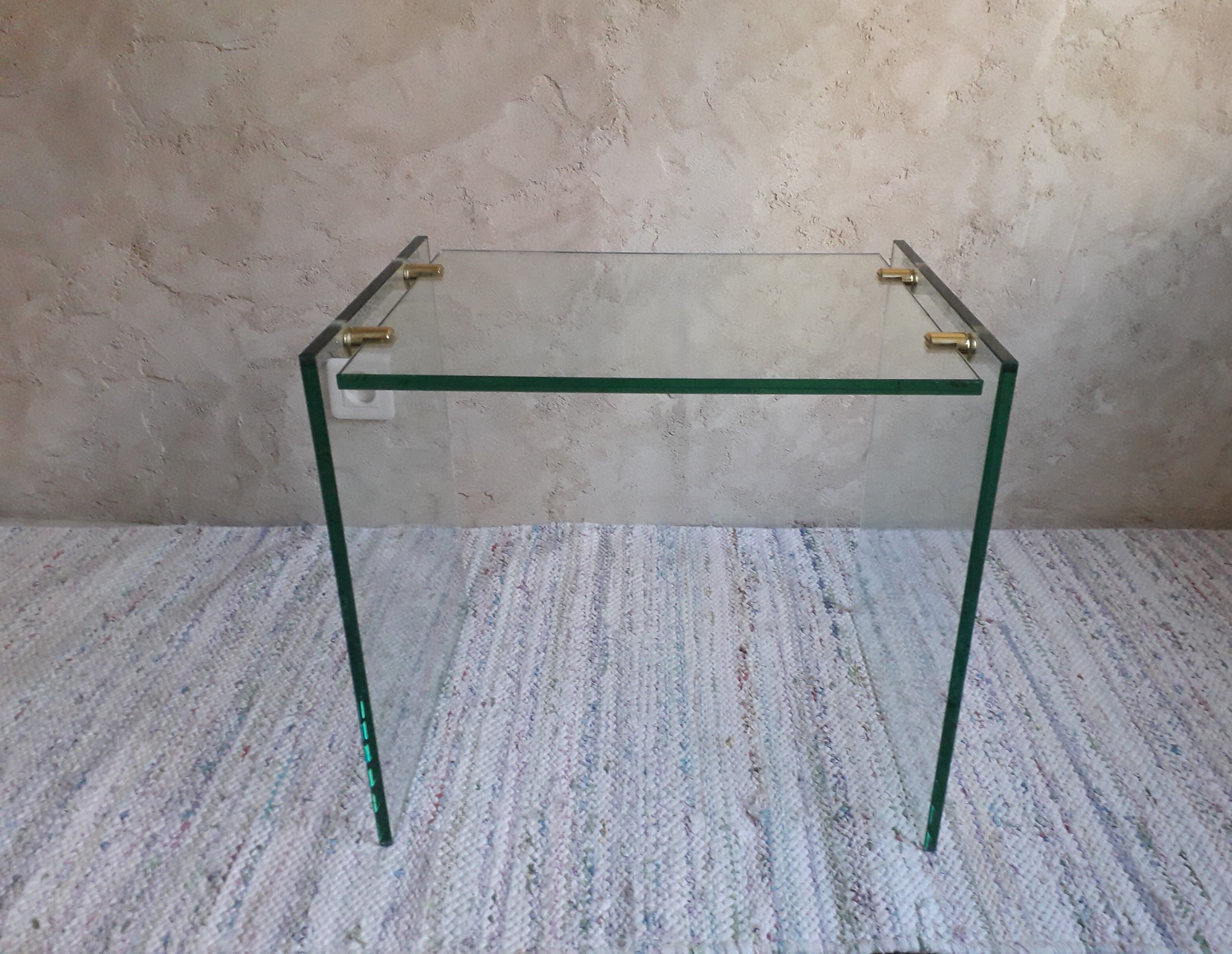 Glass and brass coffee table