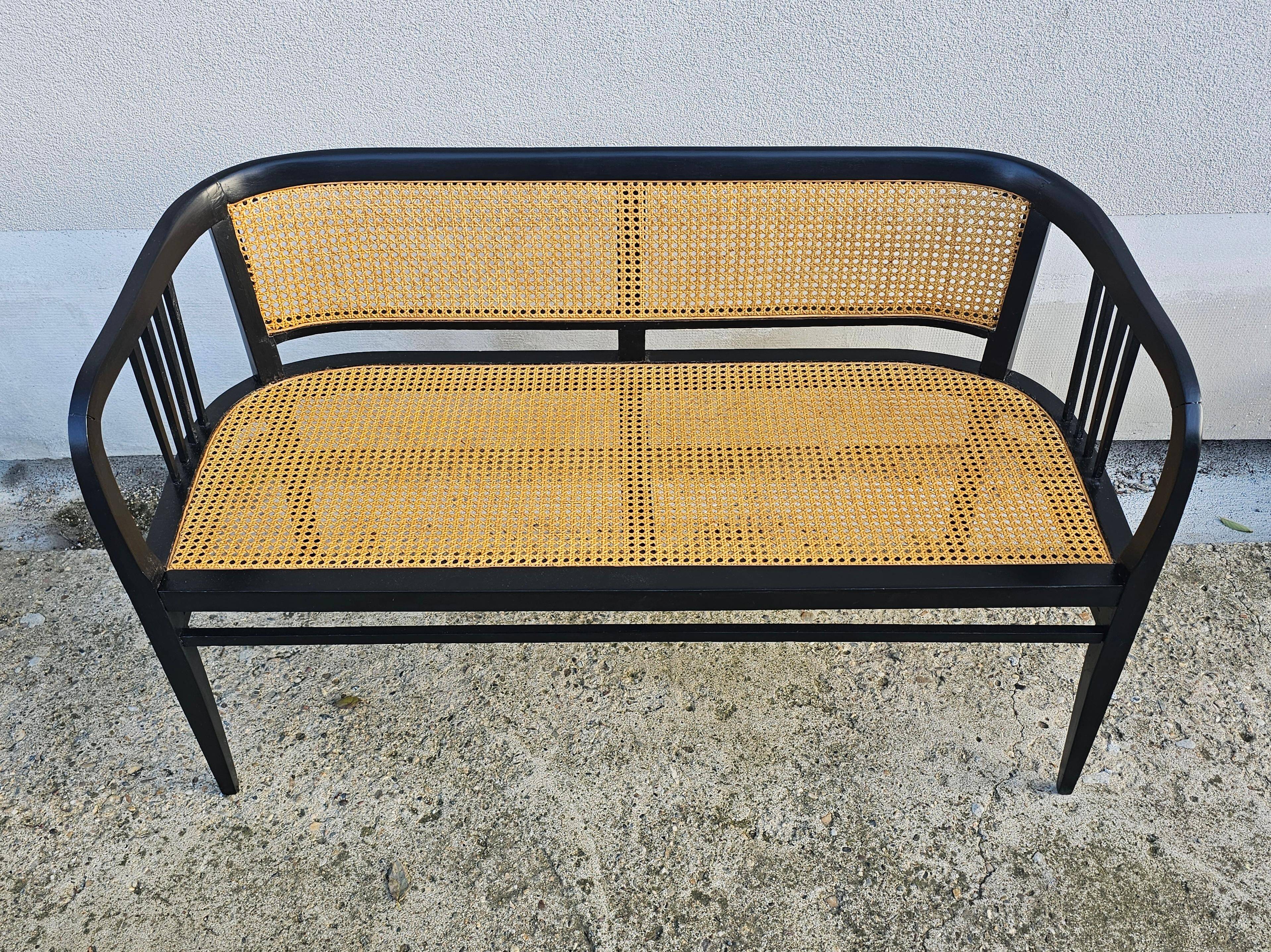 Vienna Secession beech canapé with cane seat and backrest.