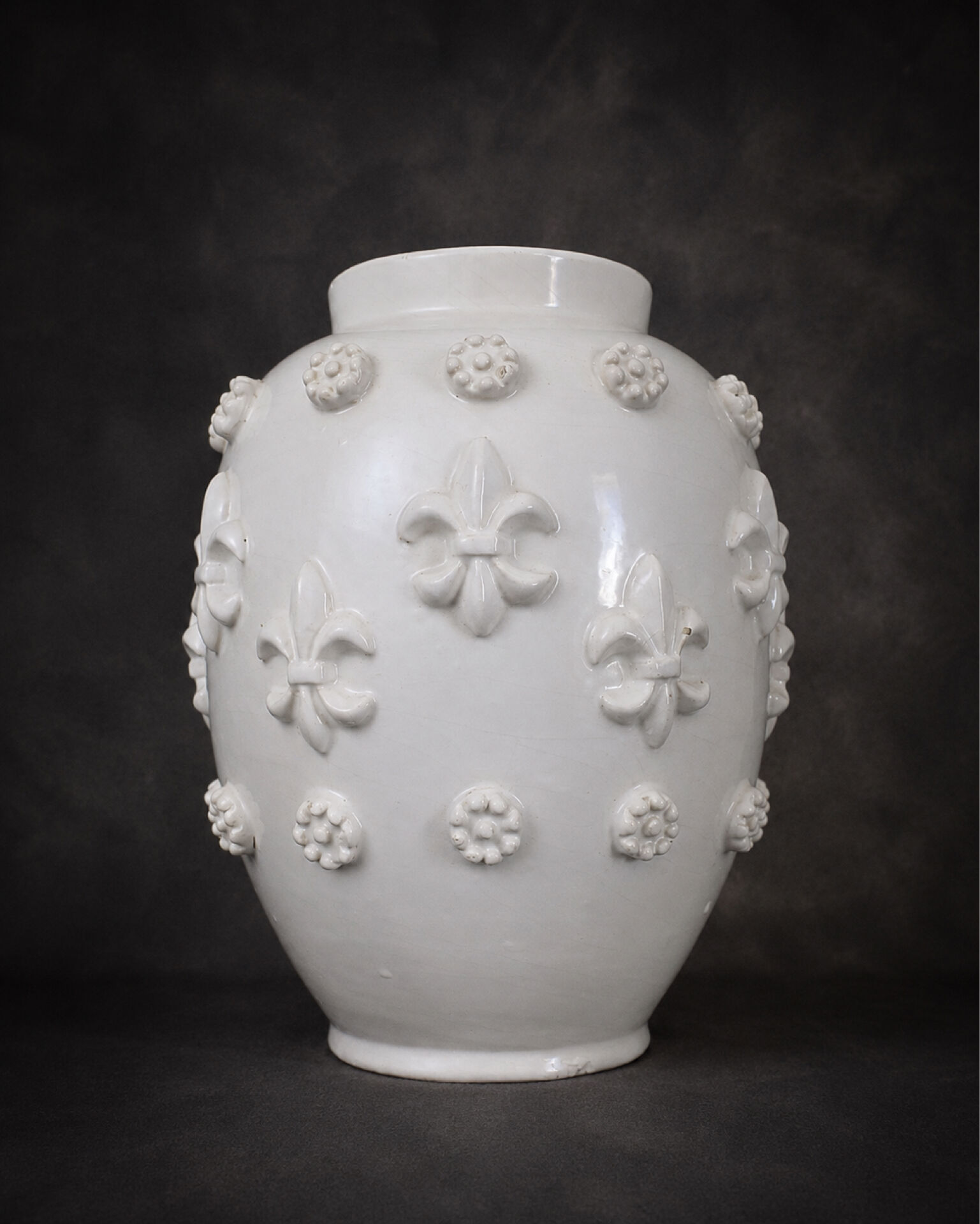 Large vase signed Emile Tessier with a lily flower design.