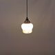 Small Art Deco hanging lamp in cream colored glass with bakelite top. Estimated 1950s