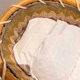 Vintage rattan doll basket