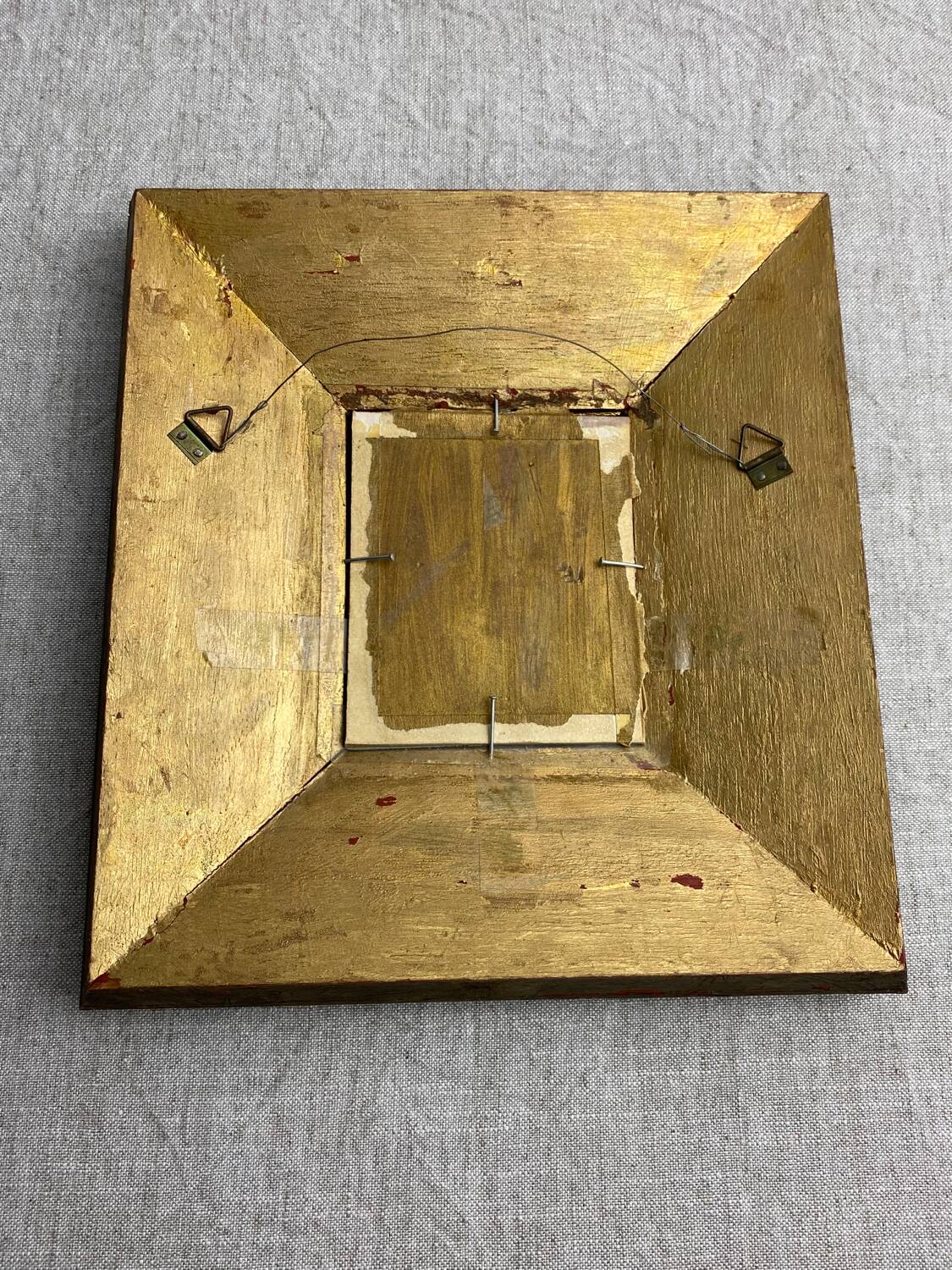 Eglomisé mirror with wooden parecloses