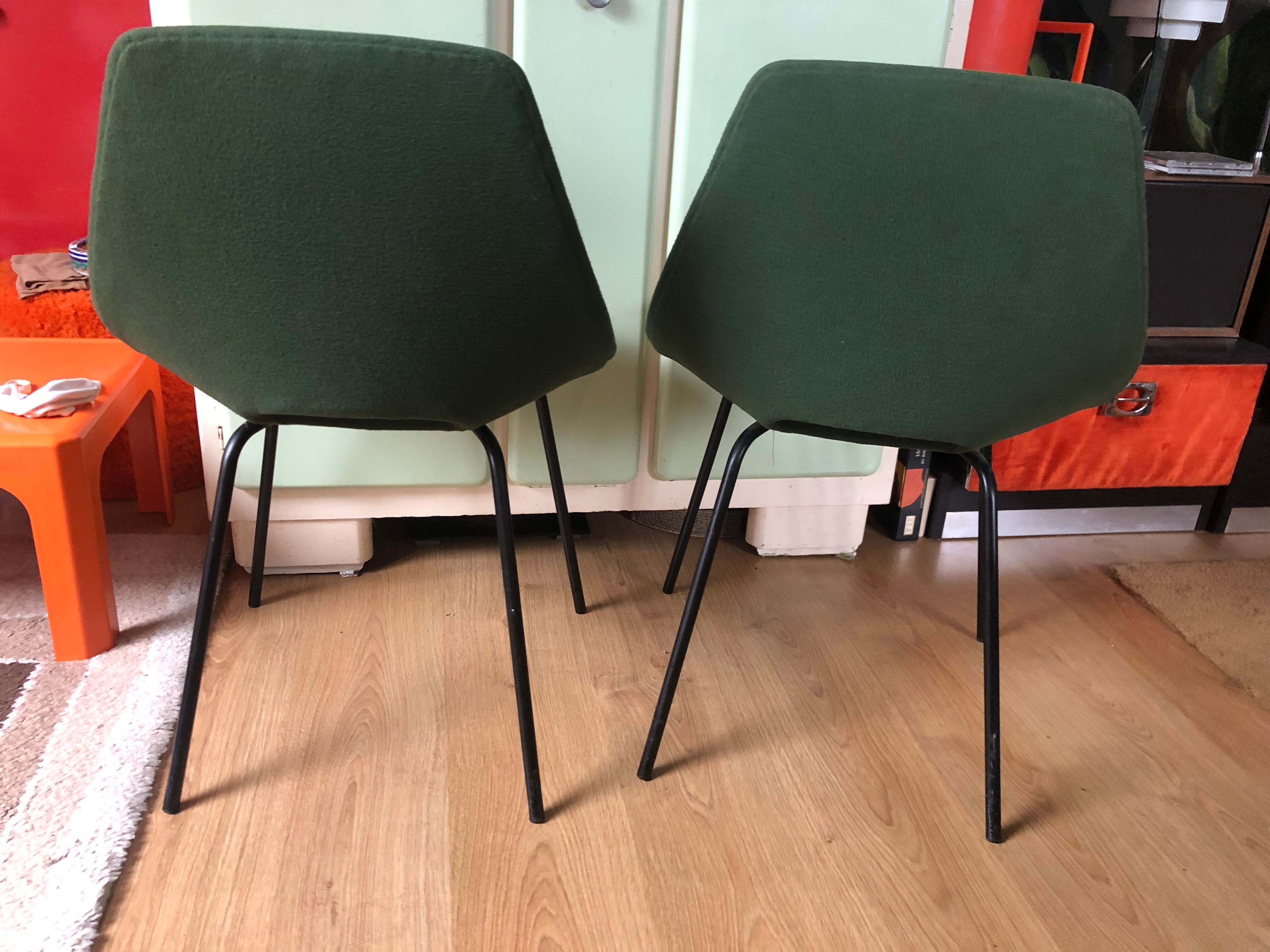 Pair of tonneau chairs by Guariche Pierre for Steiner. 50