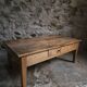 Antique French coffee table, 18th-century cherry farmhouse table with a drawer.
