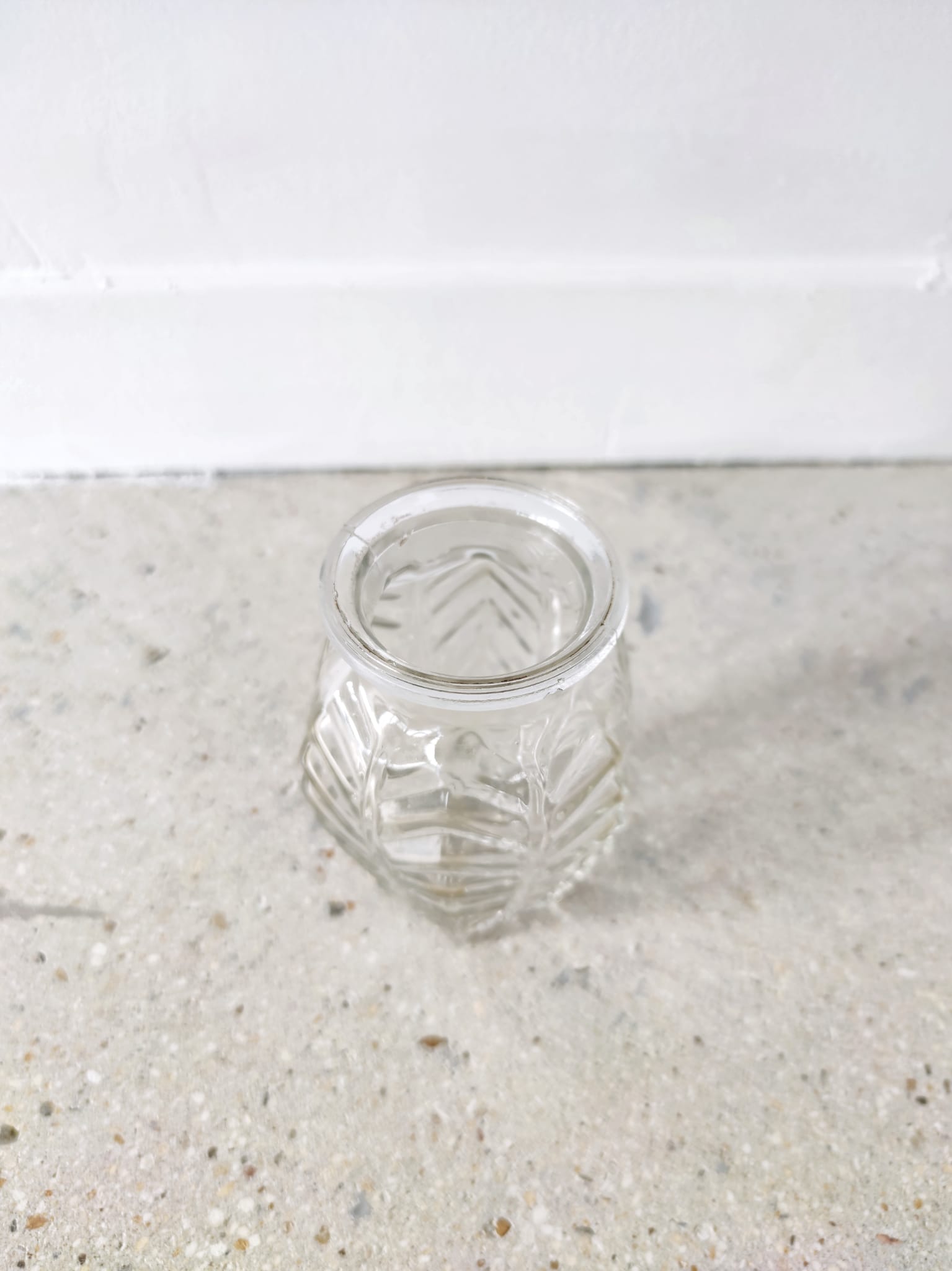 Small transparent molded glass vase