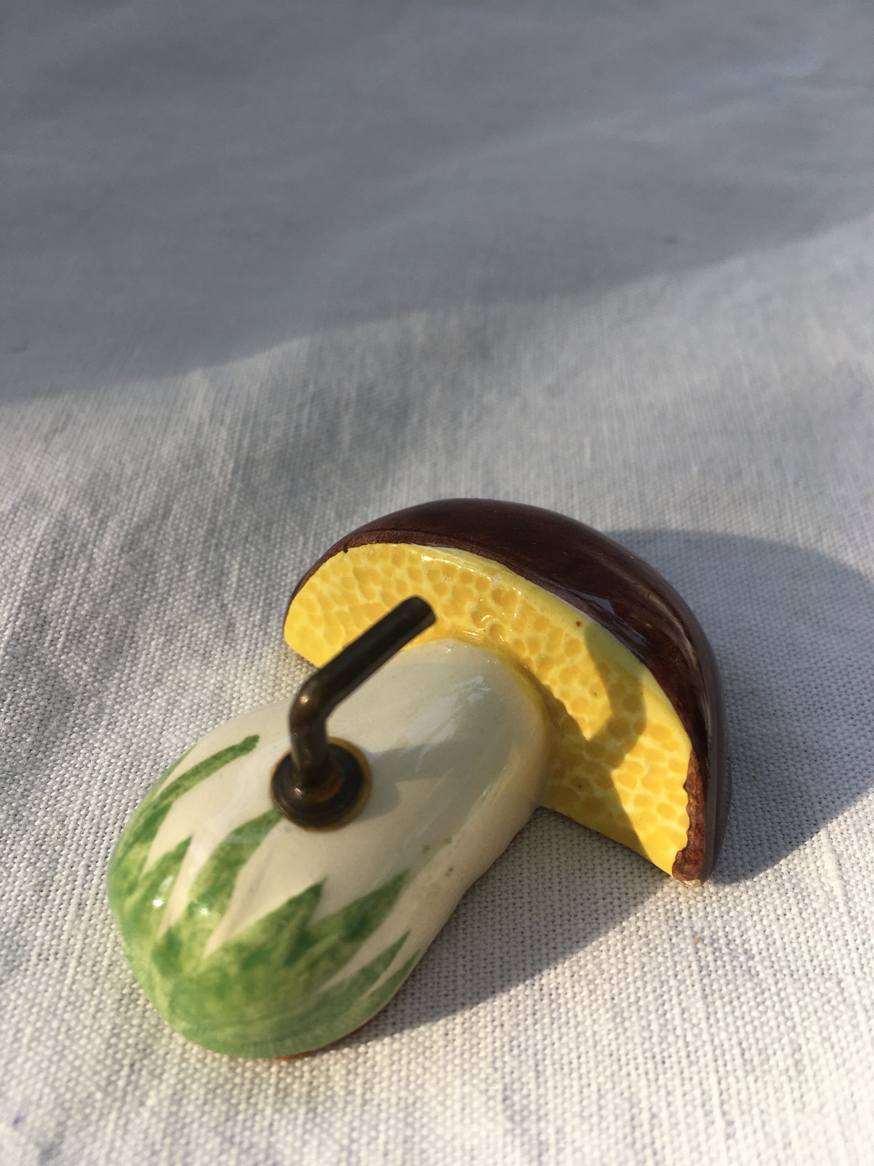 Lot of slurry hooks in the shape of plants and animals