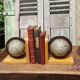 Pair of greenhouses vintage wooden books world map