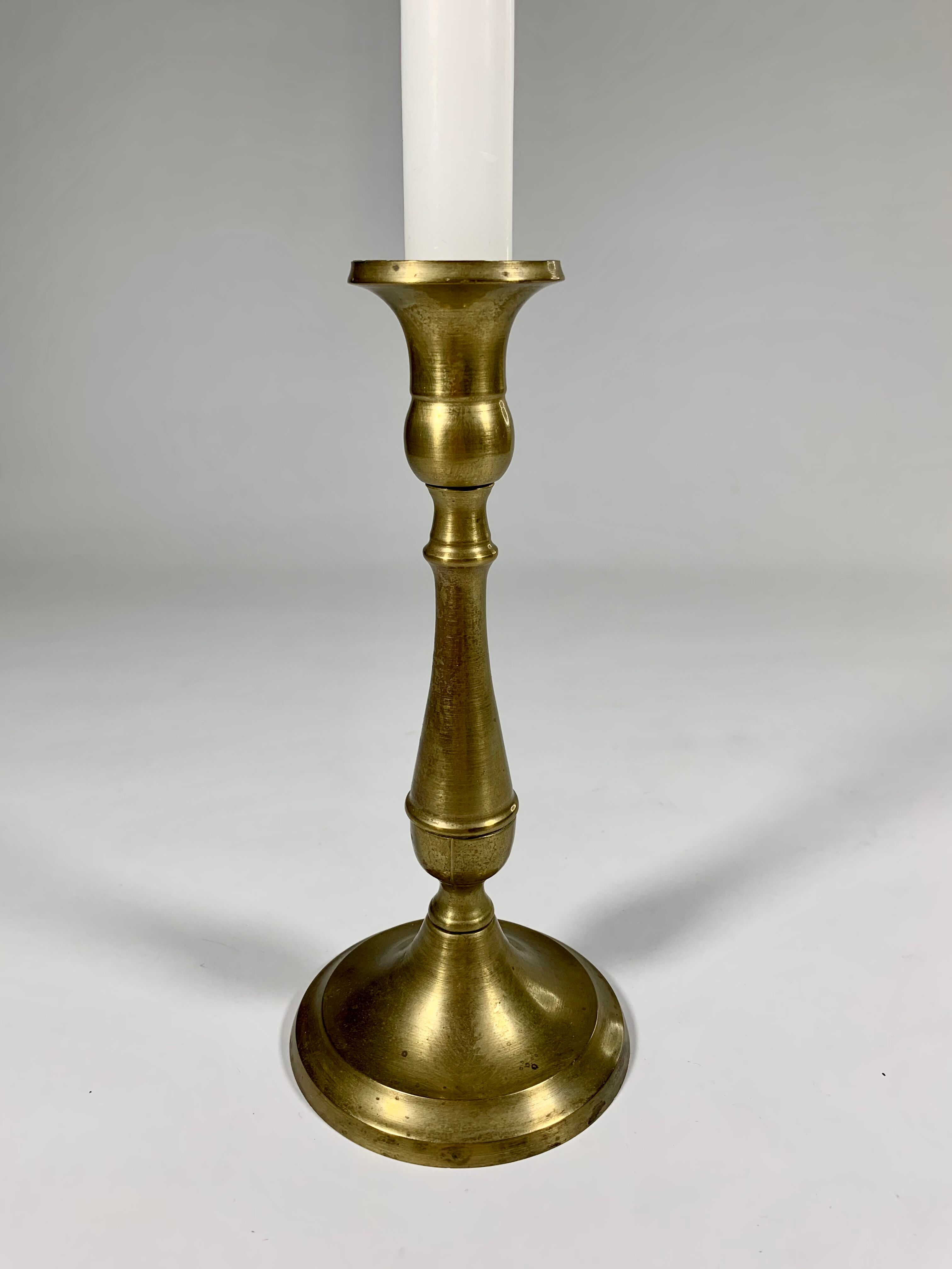 Candlestick in patinated gilded copper late nineteenth century