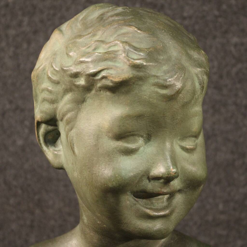 Sculpture in bronze painted terracotta bust of a child