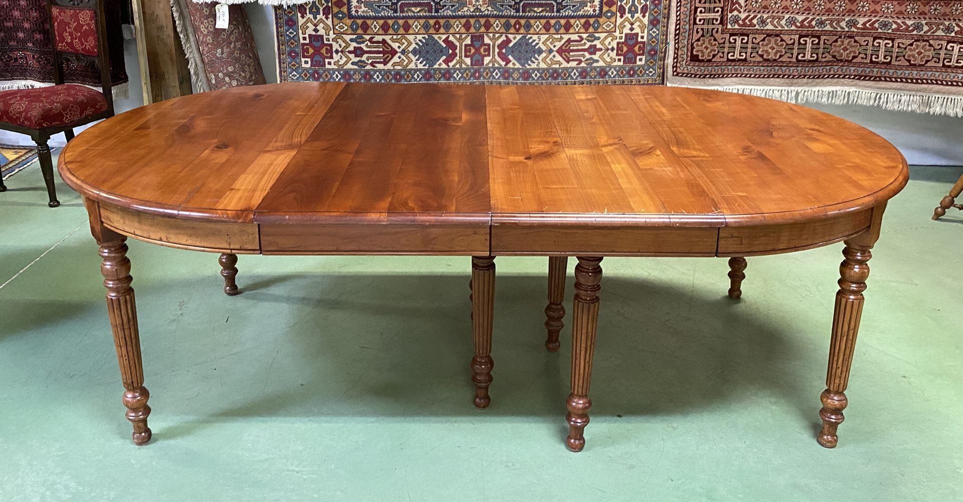 Louis Philippe round table 8 feet in cherry with 6 extensions
