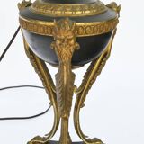 Lamp in gilded bronze and black lacquered metal