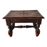 Old carved wooden footrest