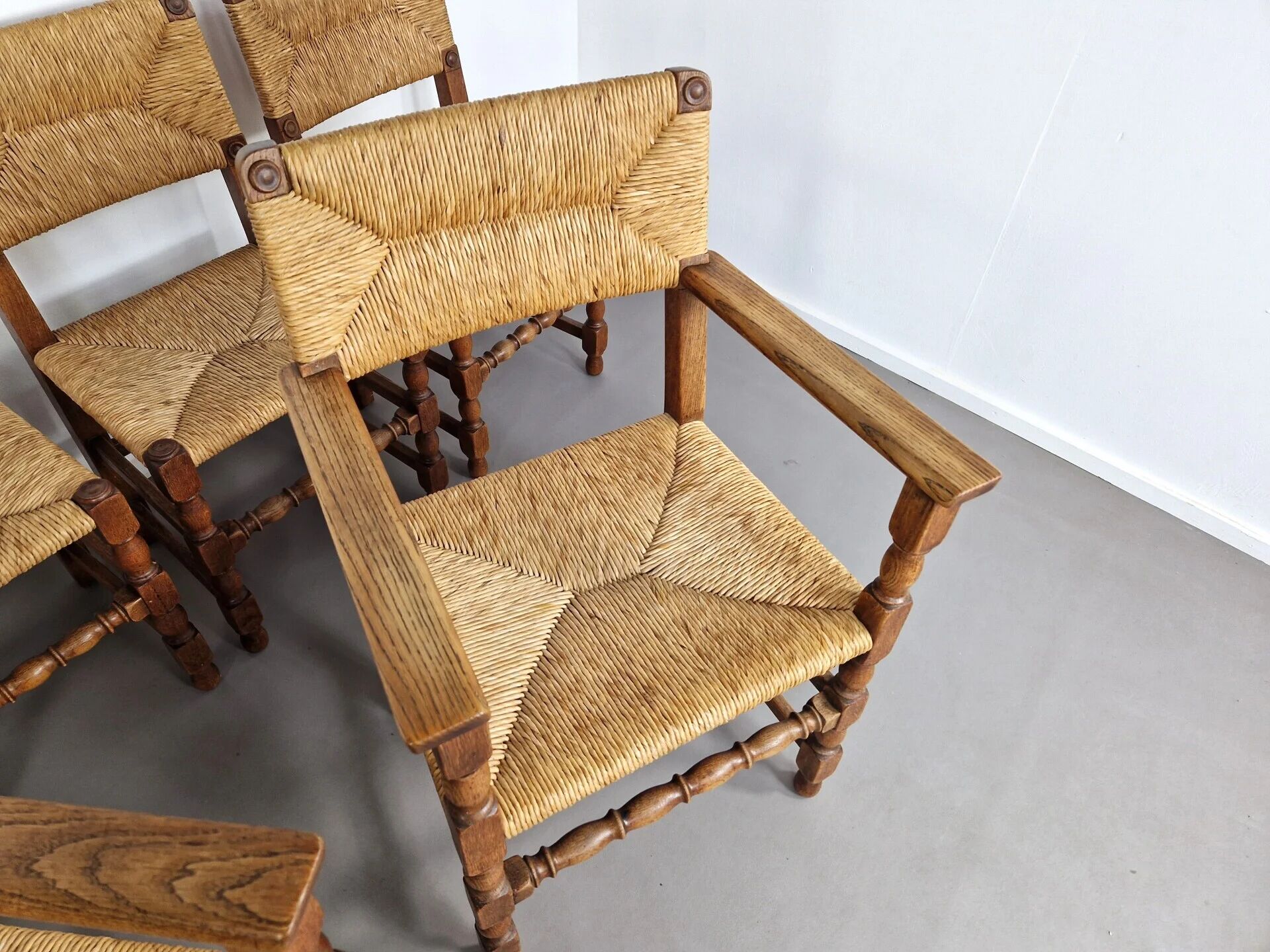 Set of French primitive rush chairs | 1930s