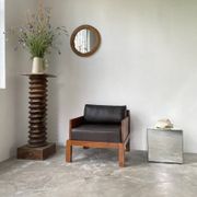 Fauteuil moderniste bois exotique et cuir