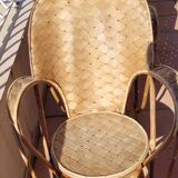 Chestnut braid armchairs from the 70s