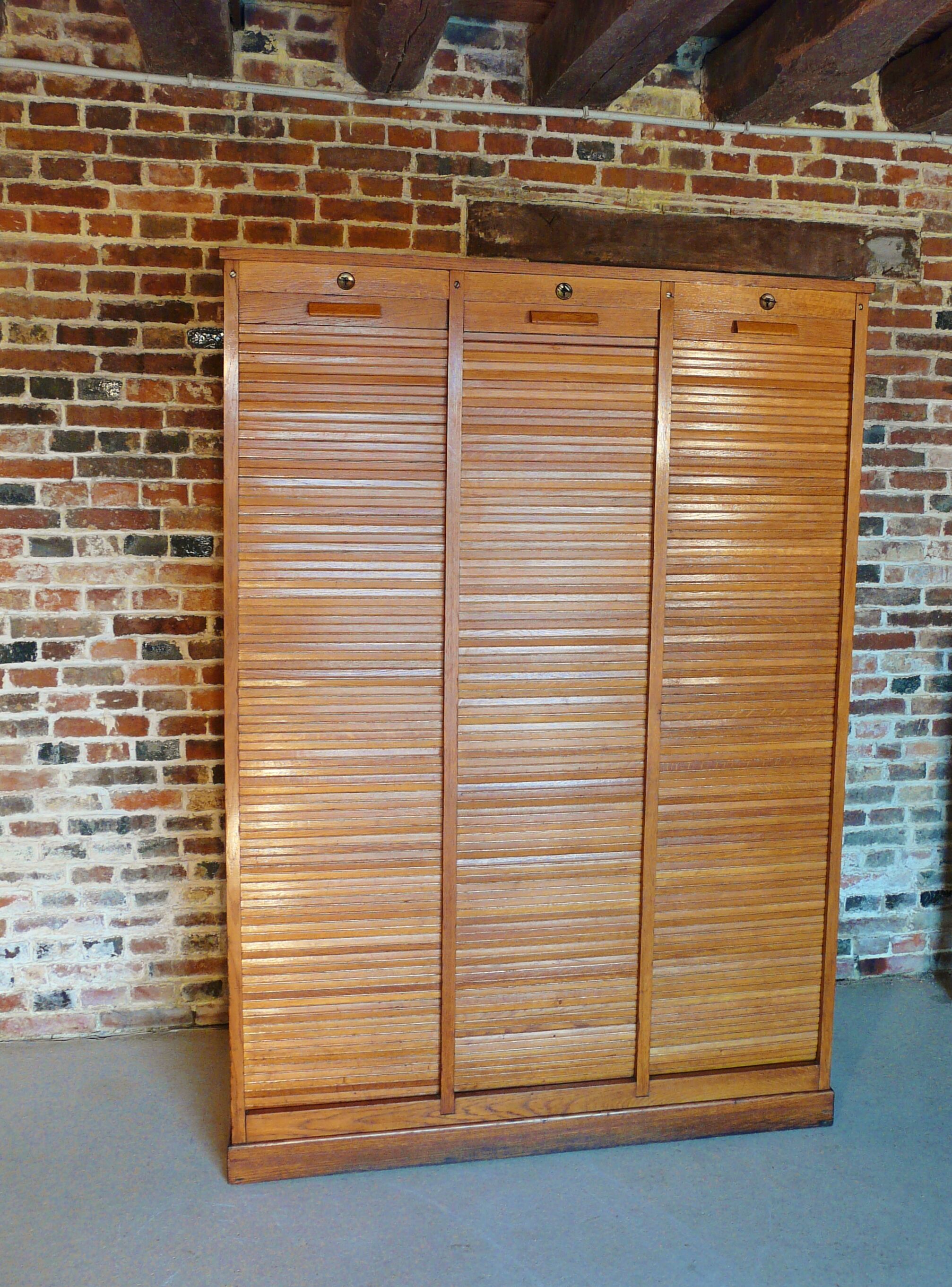 Furniture filing three curtains in oak 50s