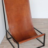 Pair of vintage armchairs in stretched leather and metal structure