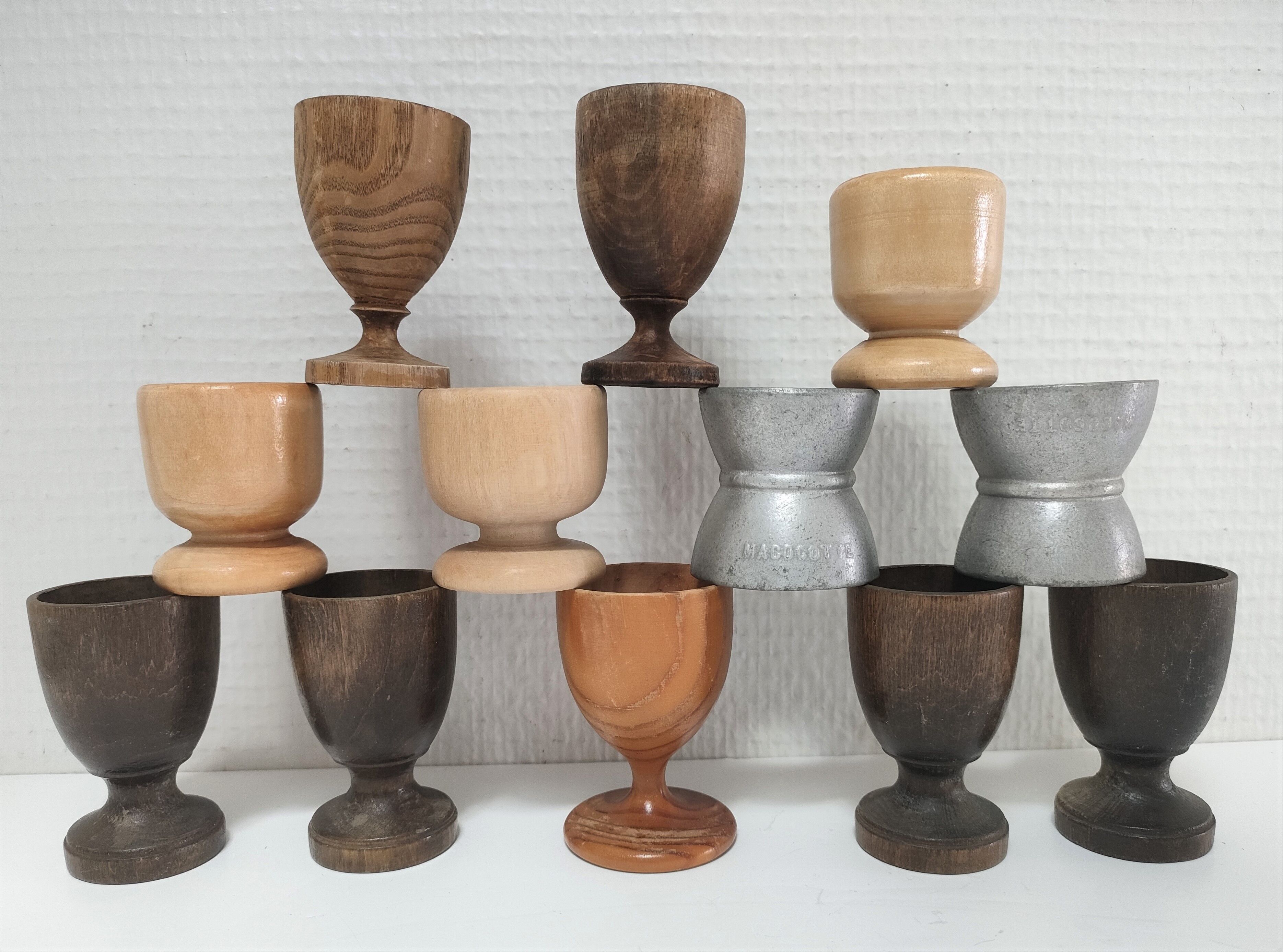 Set of twelve turned wood shells and vintage aluminum