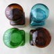 Set of 4 jars or bottles in colored glass Ariel 70s